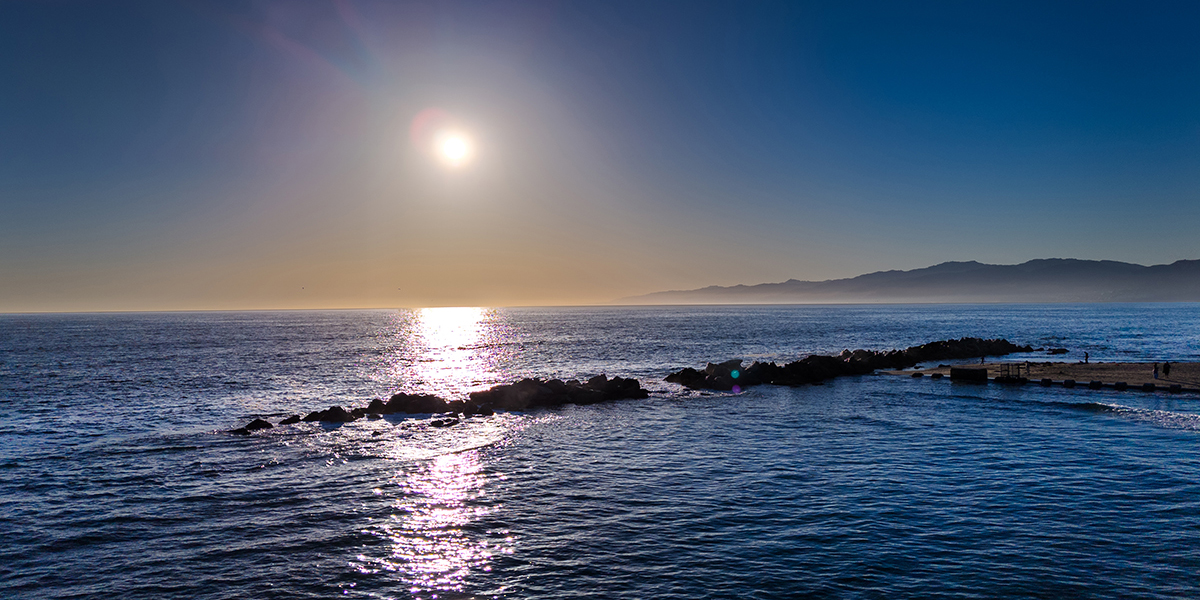 Sunset over the Venice Beach Breakwater, California